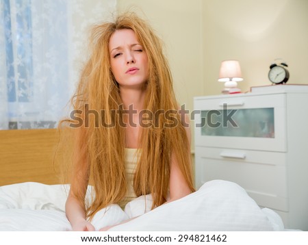 Young beautiful woman with messy hair