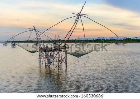 Fishing gear. Bamboo and netting. Of fishermen in Phatthalung Thailand On a beautiful evening light.