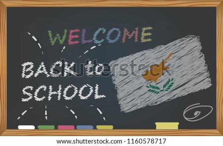 Back to school with learning and childhood concept. Banner with an inscription with the chalk welcome back to school and the Cyprus national flag