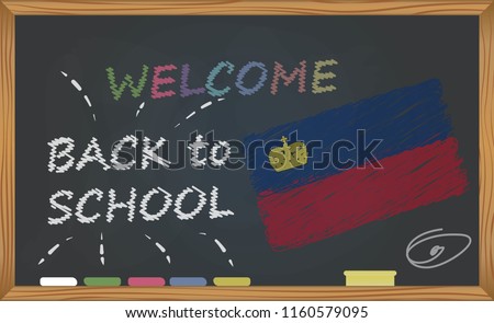 Back to school with learning and childhood concept. Banner with an inscription with the chalk welcome back to school and the Liechtenstein national flag