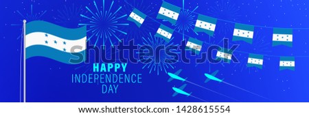 September 15 Honduras Independence Day greeting card. Celebration background with fireworks, flags, flagpole and text.