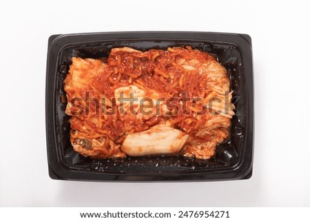 Similar – Image, Stock Photo Kimchi, fermented chinese cabbage in hot chili sauce , in bowl with chopsticks on rustic kitchen table. Close up