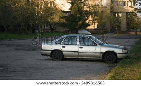 Similar – Image, Stock Photo In an old abandoned school, the photoline watched the fading light and decided to leave the building again.