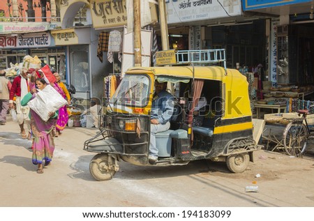 VARANASI; INDIA - FEBRUARY 21, 2014: The motor rikshaw is the typical indian means of transport