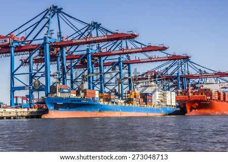 HAMBURG, GERMANY - APRIL 19, 2015: A container ship is in a container terminal in the harbor of hamburg, Germany. A ship lies not more than one day in the terminal.