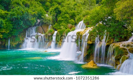 Similar – Image, Stock Photo Lake flowing near green trees