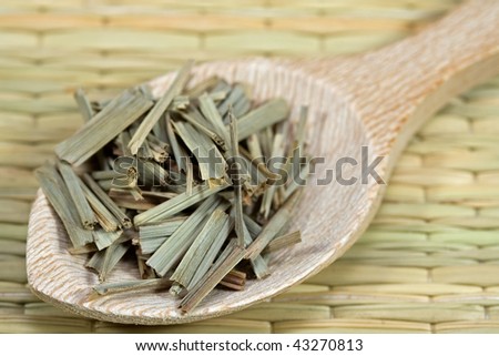 lemon grass on a wooden spoon