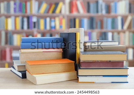 Similar – Image, Stock Photo Pile of books and dried flowers on wooden table