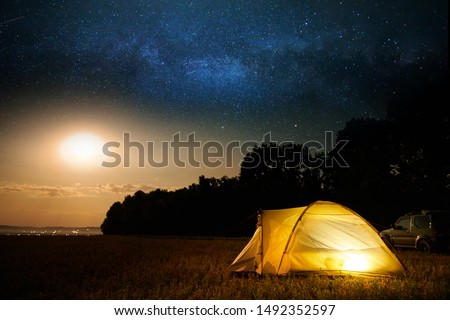 Similar – Image, Stock Photo illuminated yellow tent at dusk with milky way in the sky