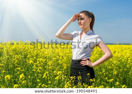business woman at the yellow flower field