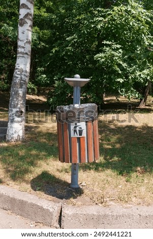 Similar – Foto Bild Baum, Mülleimer und Bank im Park