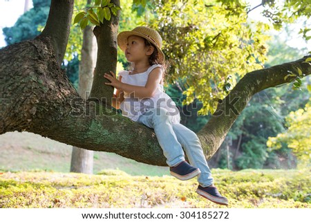 Tree climbing girl