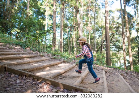 Similar – Image, Stock Photo Children climb a hill in the forest