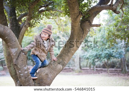 Similar – Image, Stock Photo Climbing a tree Parenting