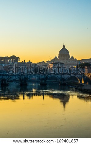 View of Saint Peter\'s dome in Rome (Italy) at sunset