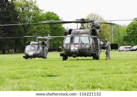 Eugene, Oregon, USA Ã¢Â?Â? May 2, 2012: Eugene, OR Emergency Services and National Guard work in a disaster response drill. The unidentified flight crews are standing by waiting for injured to arrive.