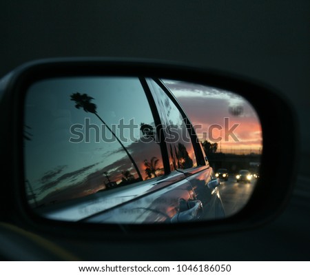 Similar – Image, Stock Photo Driving through Los Angeles in a convertible. LA, California.