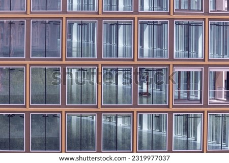 Similar – Image, Stock Photo Close-up of the facade of a red-painted half-timbered house with two windows and clearly visible beam construction