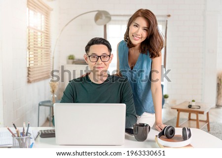 Similar – Image, Stock Photo Happy couple colleagues hugging on the street