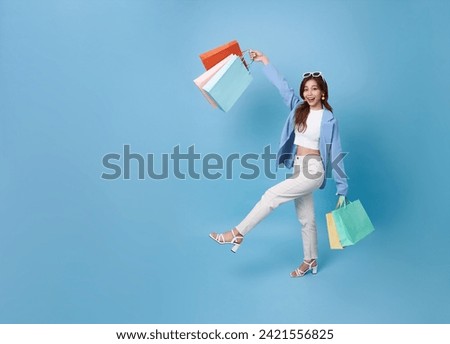 Similar – Image, Stock Photo Beautiful Asian girl walking on the beach in Autumn during her trip