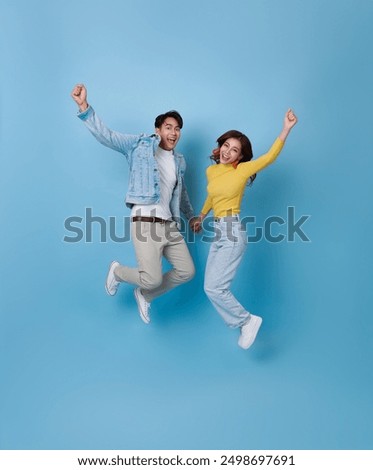 Image, Stock Photo A happy teenager is texting on a mobile phone, lying on the floor in the living room. Modern technologies, online communication