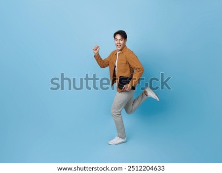 Similar – Image, Stock Photo Confident Asian man walking along city street