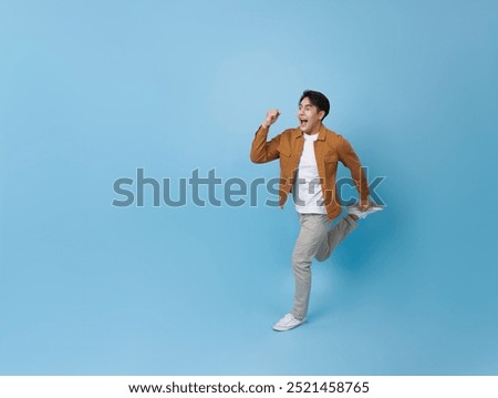 Similar – Image, Stock Photo Confident Asian man walking along city street