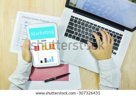 Business  hold tablet  show data marketing .