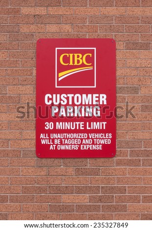TRURO, CANADA - NOVEMBER 30, 2014: CIBC customer parking sign.The Canadian Imperial Bank of Commerce is a Canadian chartered bank. CIBC is headquartered in Toronto, Ontario, Canada.