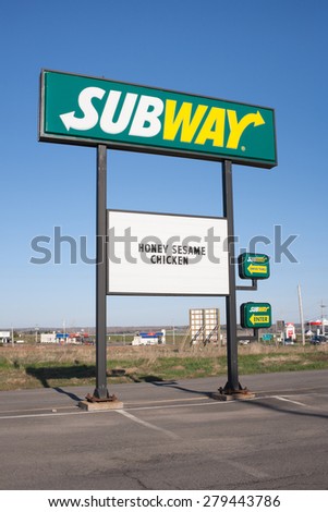 STEWIAKE, CANADA - MAY 18, 2015: Subway sign. Subway is an American fast food franchise offering sub sandwiches and salads. Subway has over 42,912 restaurants worldwide.