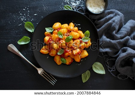 Similar – Foto Bild Gnocchi mit Tomatensauce und Parmigiano auf einem Teller.