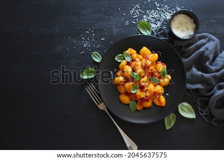 Similar – Foto Bild Gnocchi mit Tomatensauce und Parmigiano auf einem Teller.