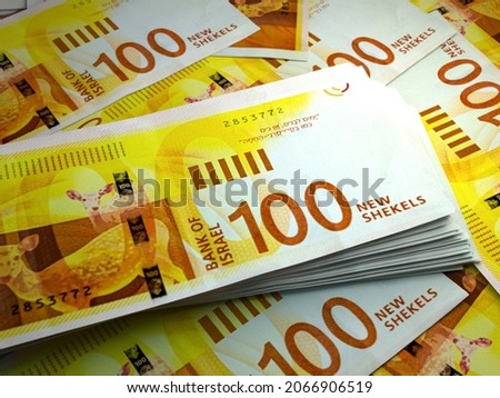 Money of Israel. Israeli new shekel bills. ILS banknotes. 100 shekels. Business, finance, news background. 3d illustration. Foto d'archivio © 