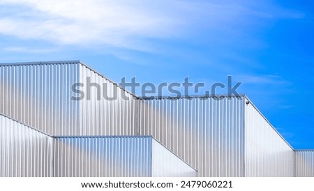 Similar – Image, Stock Photo Geometrical bright buildings on embankment of river