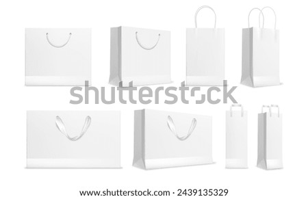 Paper shopping bag isolated vector illustration of realistic white shop packages. Empty shopper bags template, supermarket shop mall packs. Retail present bags, sale merchandise products