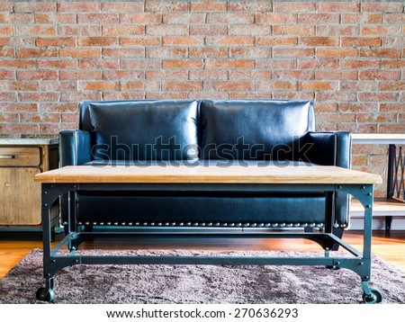 Interior design of  modern Living room with black leather couch /brick wall background