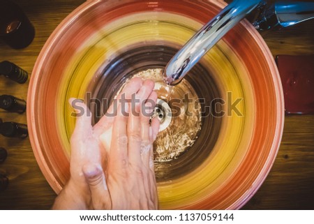 Similar – Image, Stock Photo Flatlay of woman rubbing cream in her legs in bed