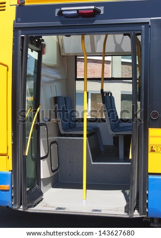 Open door of a modern public transport city bus.