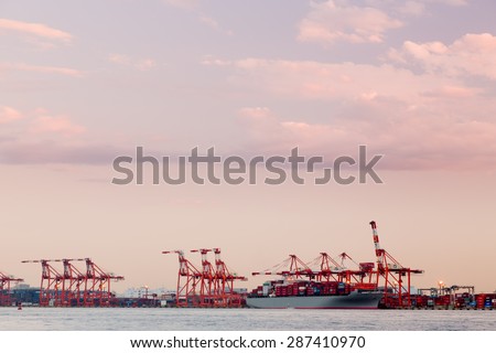ODAIBA, TOKYO, JAPAN - CIRCA JUNE 2014: Cranes as seen at Odaiba sea port. Odaiba sea port is an important port in the bay of Japan