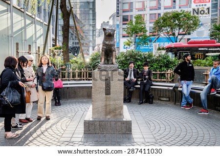 SHIBUYA, TOKYO, JAPAN - CIRCA JUNE, 2014: Bronze statue of an Akita breed dog named Hachiko. It is famous for its loyalty.