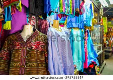 BANGKOK, THAILAND - CIRCA JULY 2015: Clothes for sale at Chatuchak weekend market. The market is the largest in Thailand and one of the largest in Asia.