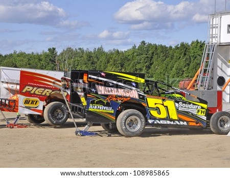ST MARCEL QUEBEC,CANADA-JULY 8:  Modified race cars at the drivers camp before the race, during the Modified and Pro-Stock Mhwk series at the RPM Speedway on July 8, 2012 in St Marcel