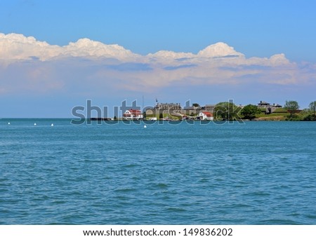 view from Niagara-on-the-Lake across the Niagara river towards Fort Niagara state park, NY state in the background