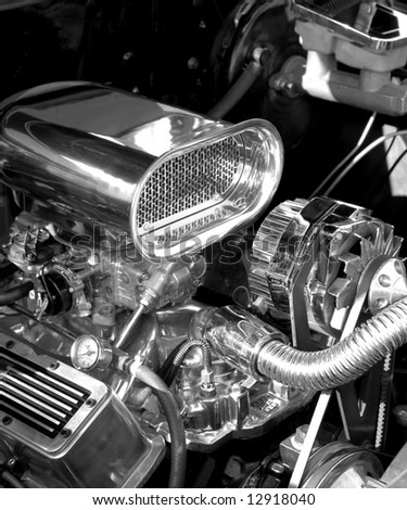 close up of a high performance car engine, black & white