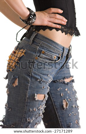 The Girl In Fashionable Jeans With Holes Stock Photo 27171289 ...
