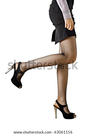 Lower body slender young girl. She has beautiful legs and high heels. Isolation on white background.