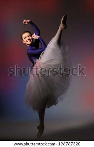 ballet dancer in jump on multicolor background
