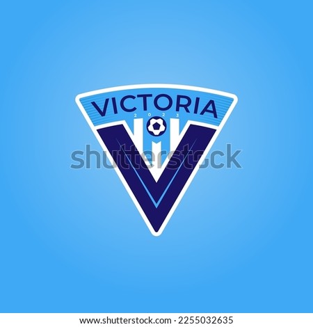 Modern 2-color Victoria Soccer (football) Club blue and white vector emblem with a soccer ball, stripes, and the letter V inside. Suitable for embroidery and application on any surface.