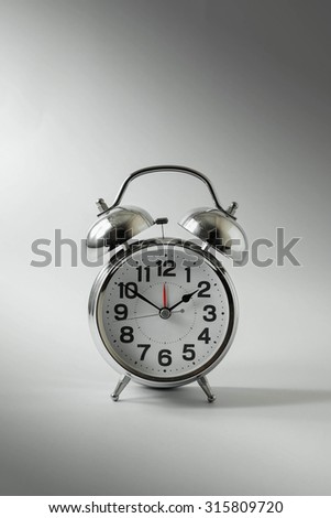 Silver alarm clock