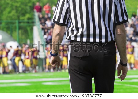 American football referee - seconds before the game starts.